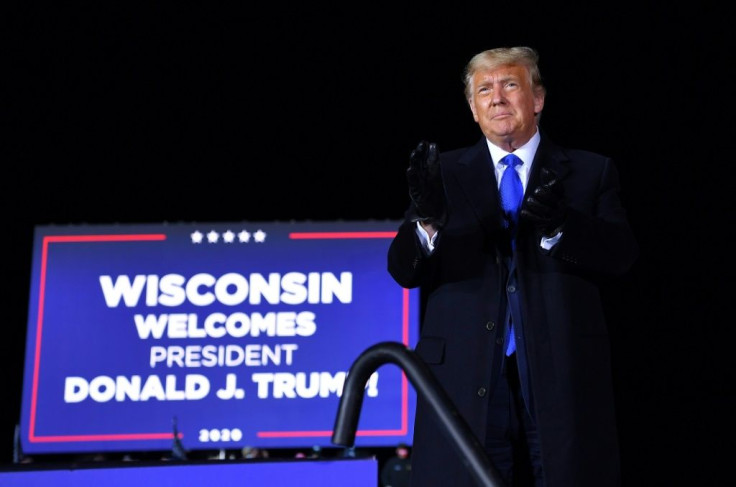 US President Donald Trump arrives to speak during a campaign rally at Waukesha County Airport in Waukesha, Wisconsin on October 24, 2020