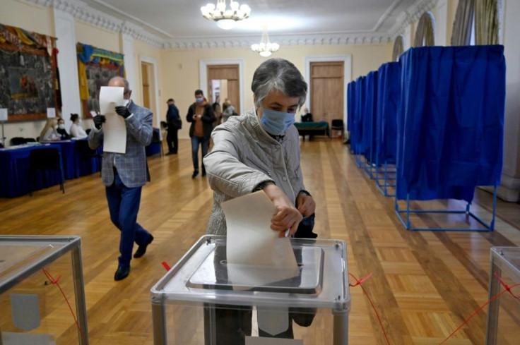 Sunday's vote is first held in Ukraine since the start of the coronavirus pandemic