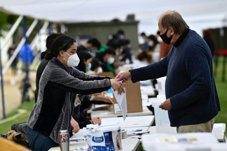 Voting in Santiago, Chile in a referendum on the dictatorship-era constitution