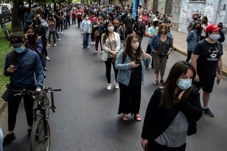 Chileans are asked two questions on the ballot: to approve or reject a new constitution, and if necessary, what kind of body should draft it -- a mixed assembly composed equally of lawmakers and citizens, or a 155-member convention of citizens