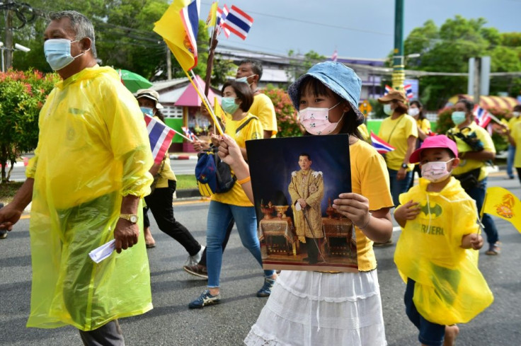 Pro-royalists have held portraits of Thailand's king during rallies in support of the monarchy
