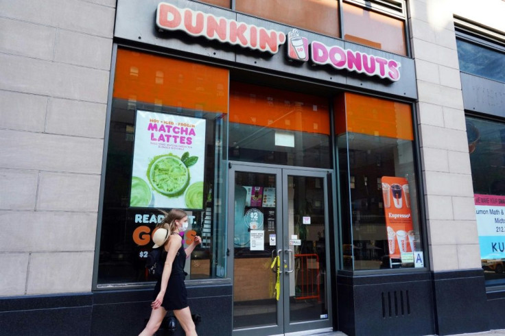 Shares of Dunkin' Brands surged as it confirmed talks to potentially be acquired