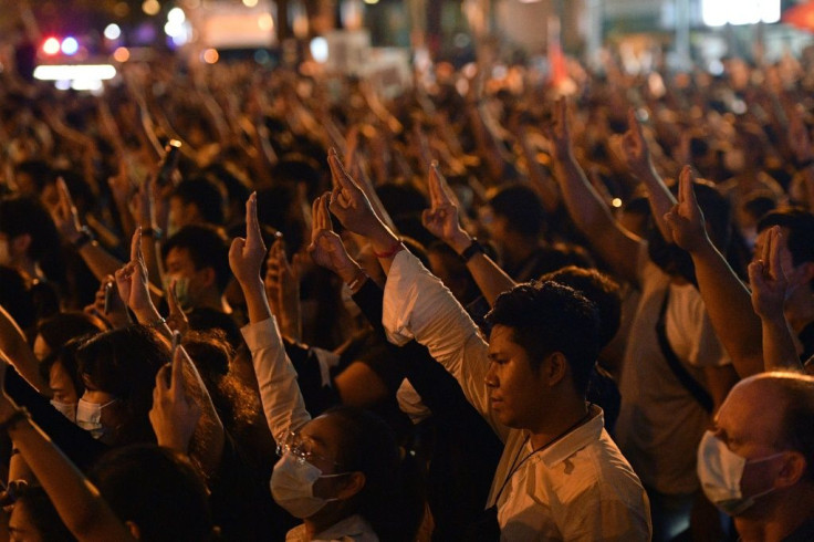 Pro-democracy protesters have adopted the hold the three-finger salute