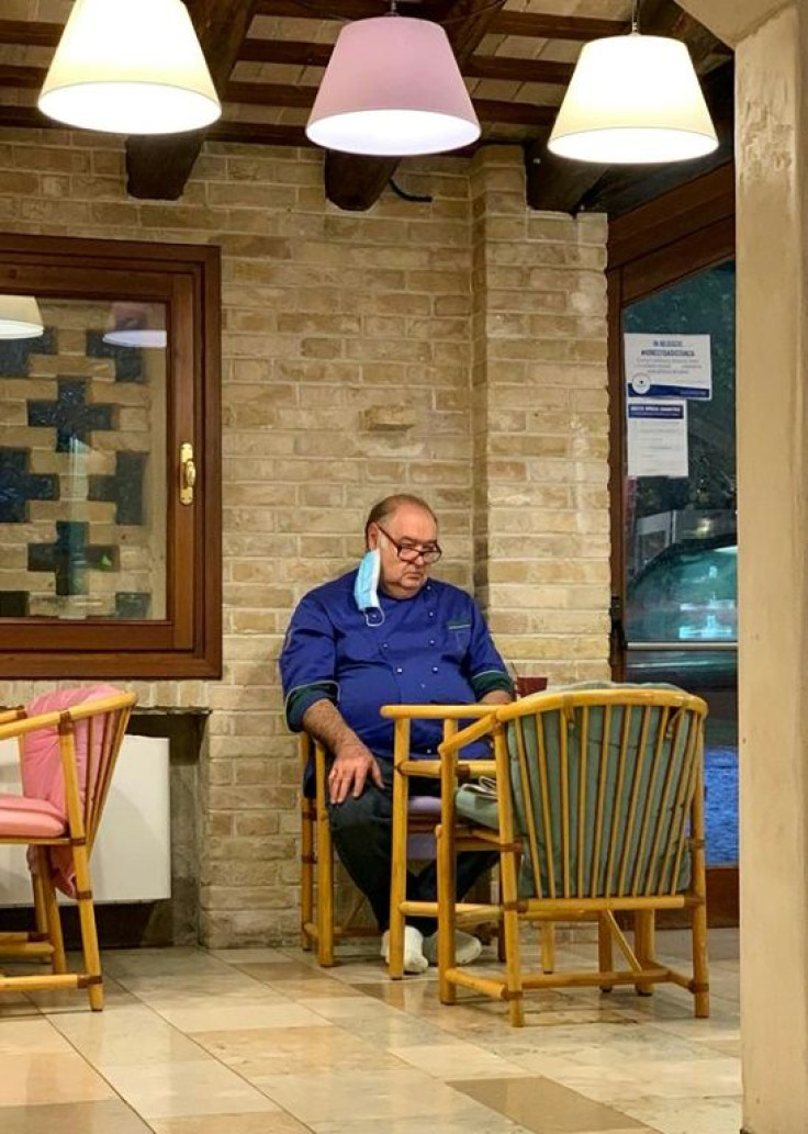 A photo of dejected restaurant owner Giuseppe Tonon went viral in Italy