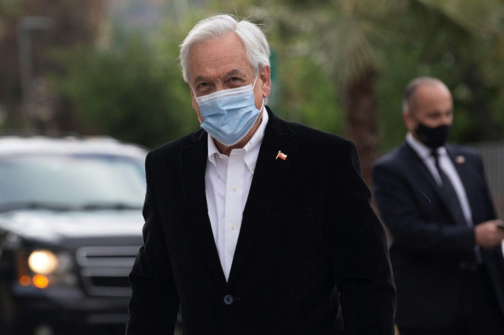 President Sebastian Pinera, pictured voting on October 25 2020, has been badly bruised by the referendum result, say analysts