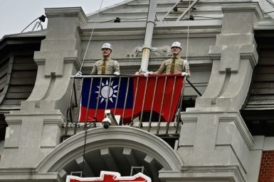 Taiwan's military police prepare to raise the flag during a ceremony to mark Taiwan National Day at the Presidential Office in Taipei on October 10, 2020