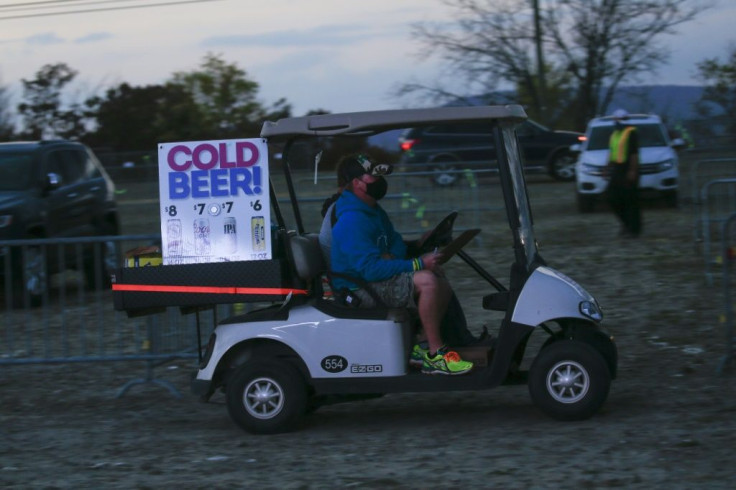 The "bar" at the Disco Biscuits concert -- a golf cart drives between rows of parked cars delivering drinks that party-goers purchased on an app