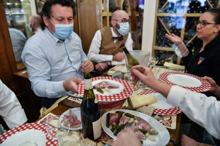 A traditional morning meal inside a "bouchon", a restaurant typical of Lyon in southeastern france.