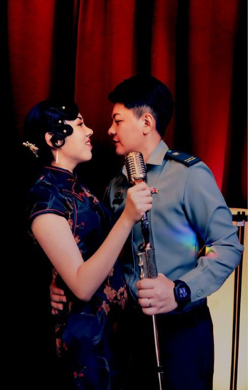 One of the Taiwanese couples to be wed on Friday pose for a photo