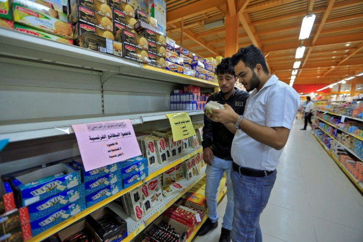 Signs were placed on shelves in the Yemeni capital Sanaa calling on customers to boycott French goods