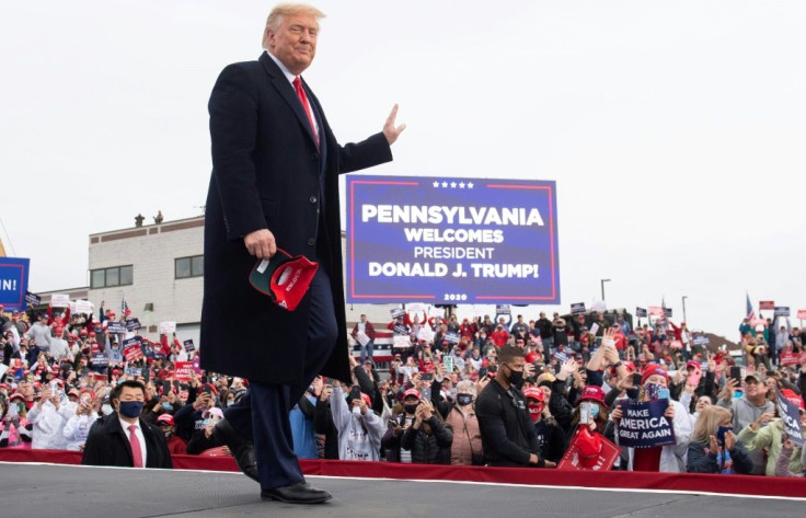 President Donald Trump heads for Michigan, Wisconsin and Nebraska with a week left in the US presidential campaign