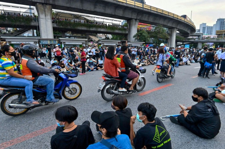 Many motortaxi drivers say they sympathize with the protesters' goals -- and are happy to lend a helping hand