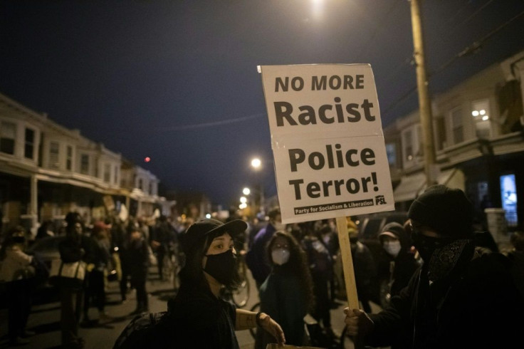 Demonstrators gather in protest near the location where Walter Wallace, Jr. was killed by two police officers on October 27, 2020 in Philadelphia, Pennsylvania