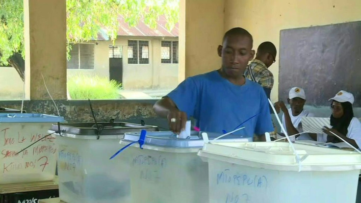 IMAGESThe first voters arrive at a polling station to vote in Tanzania's election, amid rising concern for democracy under the country's president John Magufuli, who is seeking a second term. Tensions are high in volatile Zanzibar, where violence erupted