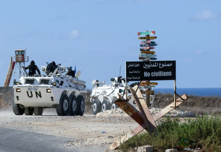 United Nations peacekeeping force (UNIFIL) vehicles patrol the Lebanese southern coastal area of Naqura by the border with Israel, on October 11