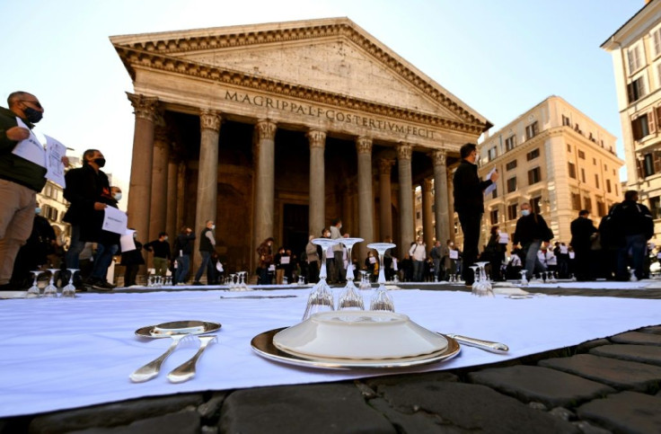Restaurant owners laid out place settings on the street in front of the Pantheon as part of a protest against coronavirus closures