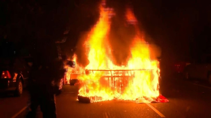 Protesters march, clash with police and set fires in West Philadelphia during a second night of demonstrations following the police killing of Walter Wallace, a 27-year-old Black man.