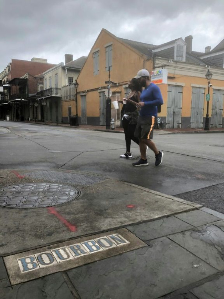 Most bars on New Orleans's Bourbon Street are closed and shuttered ahead of Hurricane Zeta's landfall