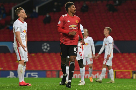 Marcus Rashford celebrates scoring his third goal and Manchester United's fifth in their big win over RB Leipzig