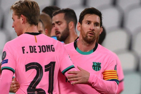 Lionel Messi with Frenkie de Jong at the end of Barcelona's 2-0 win away to Juventus