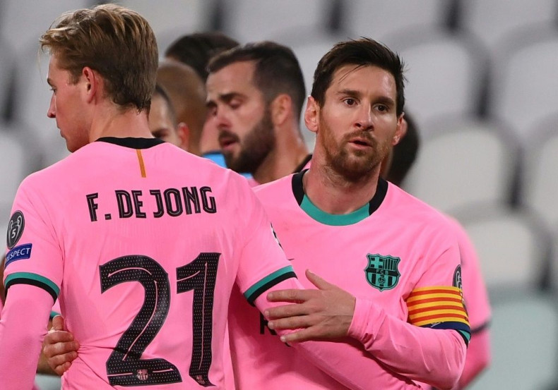 Lionel Messi with Frenkie de Jong at the end of Barcelona's 2-0 win away to Juventus