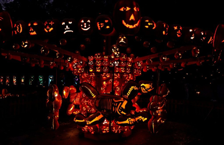 In Croton-on-Hudson visitors, many in costume, can still stand in awe of the pumpkins, which morph into everything from a huge Statue of Liberty to a planetarium and a carousel with skeleton horses, shown here