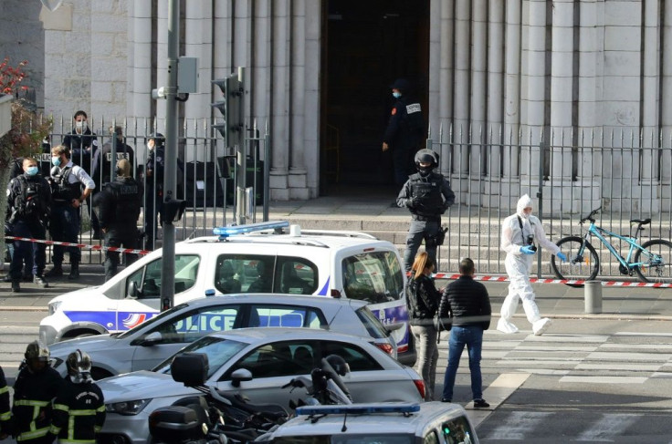 French police at the Basilica of Notre-Dame de Nice in southern France on Thursday, when a knifeman killed three people.