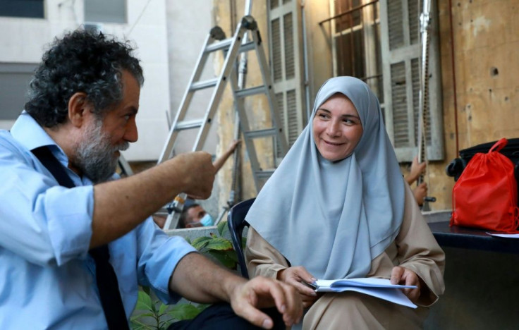Actors Mohammad Akil (L) and Mireille Panossian on the set of the short movie "Abbas and Fadel", part of the "Beirut 6:07" series streaming platform Shahid VIP on October 17