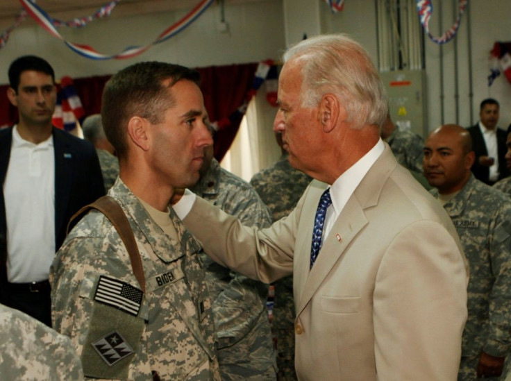 Joe Biden talks with his son, US Army Capt. Beau Biden, at Camp Victory on the outskirts of Baghdad in 2009