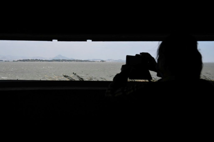 A tourist takes a photo from the Mashan Observation Post on Kinmen island