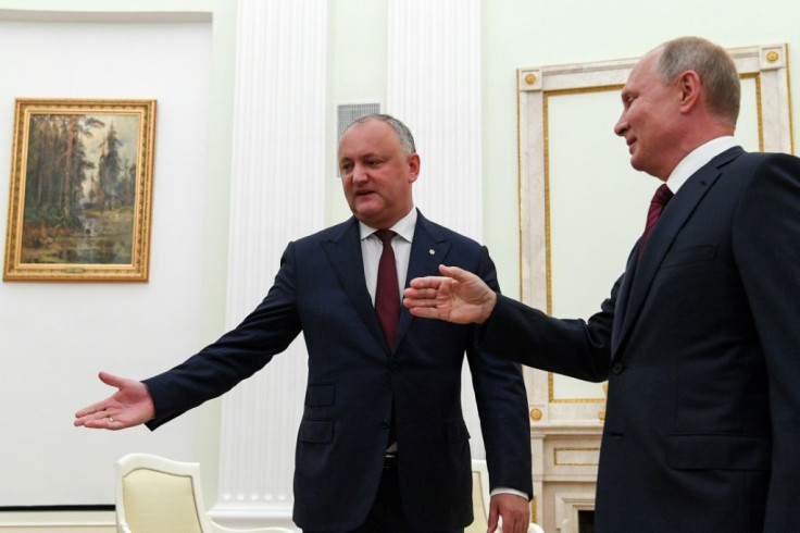 Moldovia's President Igor Dodon, seen here at the Kremlin last year, is backed by Russian counterpart Vladimir Putin (right)