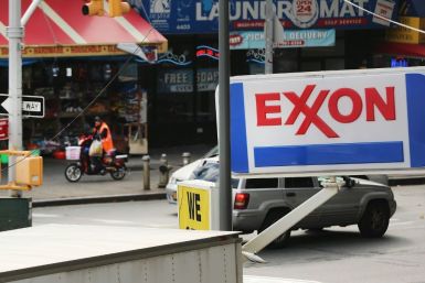 ExxonMobil reported another big loss a day after announcing it was cutting 1,900 jobs in the US