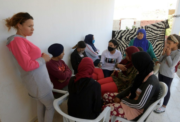 Sisters and relatives of Nice assailant Brahim Issaoui seen at the family home in Sfax, where his mother says he took to prayer, "didn't go out and didn't communicate with others"