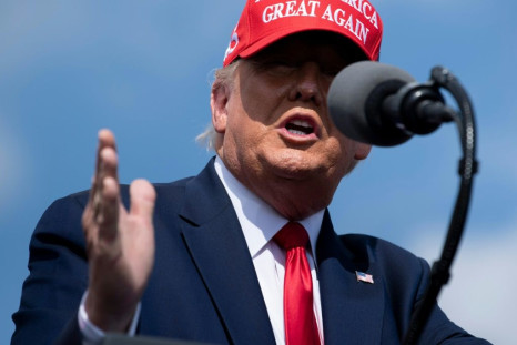 President Donald Trump -- pictured at a rally in Tampa, Florida -- has stuck to his strategy of downplaying the danger of the coronavirus and calling for businesses to reopen