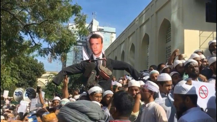 IMAGESProtesters gather outside a mosque in the Bangladeshi capital Dhaka after Friday prayers, burning an effigy of French President Emmanuel Macron. He has vowed to take the fight to religious radicals after the October 16 beheading of a history teacher