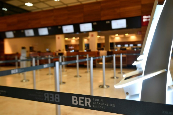 Before the madding crowds -- the check-in area at Terminal 1 of Berlin's airport gets ready for action