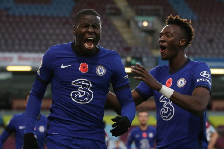 Super Zouma: Kurt Zouma (left) celebrates scoring Chelsea's second goal in a 3-0 win at Burnley