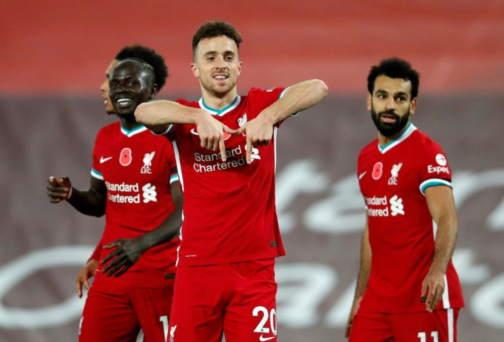 Liverpool's Diogo Jota (C) celebrates his goal against West Ham