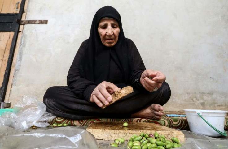 Ghatwa al-Mohommad, 80, says she is scared of coronavirus and confused about what to do -- but at the same time, afraid of leaving the camp