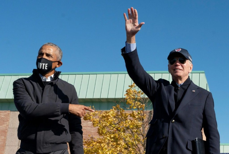 Former US president Barack Obama campaigns with Democratic presidential candidate Joe Biden in Flint, Michigan on October 31, 2020