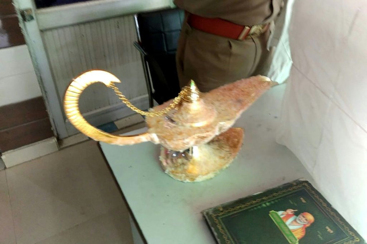 A handout photograph released by the Uttar Pradesh Police shows the lamp allegedly sold for $93,000