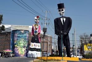 With its bright colors and cartoonish skeleton costumes, the Day of the Dead festival has become an internationally recognized symbol of Mexican culture