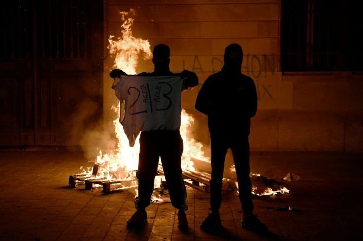 In some cities, looting and vandalism broke out on the fringes of the protests