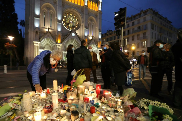 People have left tributes to the victims of the Nice attack outside the church