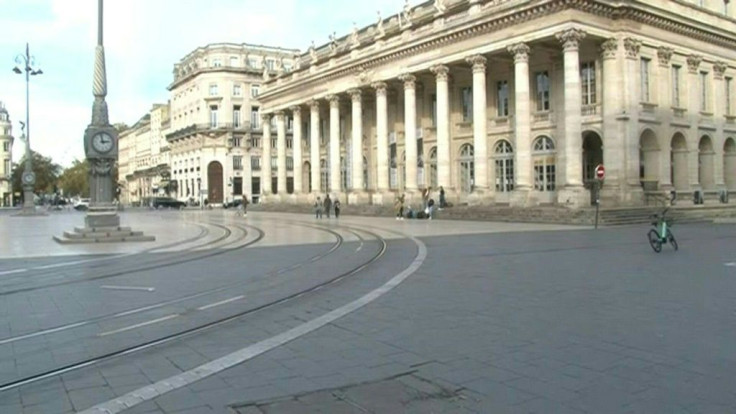 Police patrol empty streets of Bordeaux in France's first weekend of lockdown