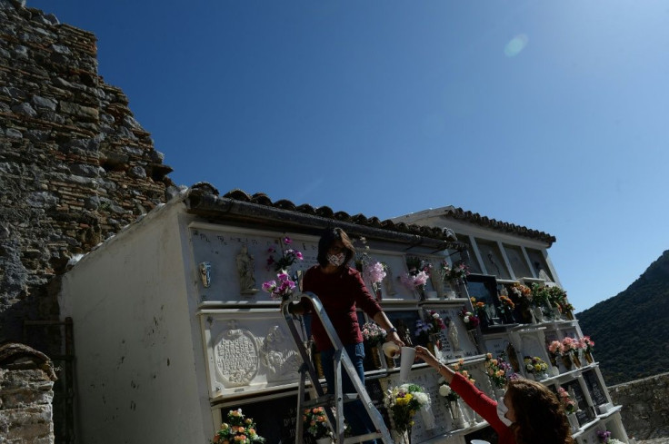 As cases have spiralled in cities, Madrid funeral workers have downed tools saying they need more staff