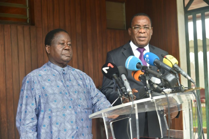 Ivorian opposition leaders Henri Konan Bedie (L) and Pascal Affi N'Guessan (R) had called for a boycott