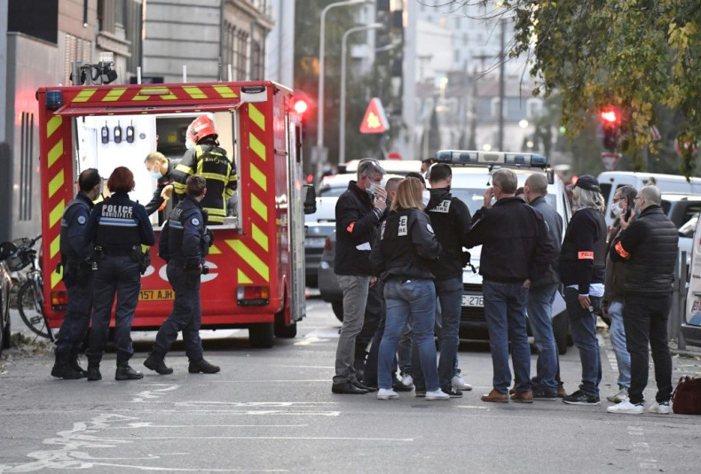 Security and emergency personnel on the scene of an attack targeting a Greek Orthodox priest in Lyon on Saturday.