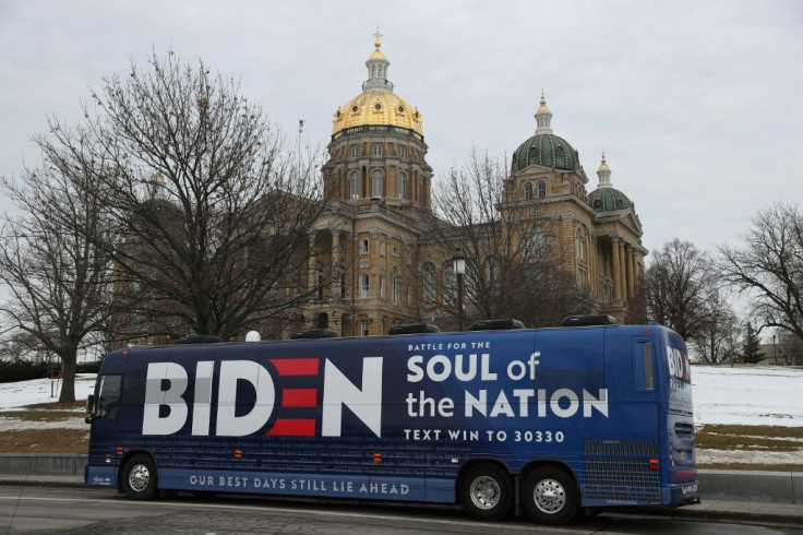 Video posted on Twitter appears to show multiple trucks waving Donald Trump flags surrounding and slowing a Biden/Harris bus (similar to this one pictured February 2020) on a Texas highway