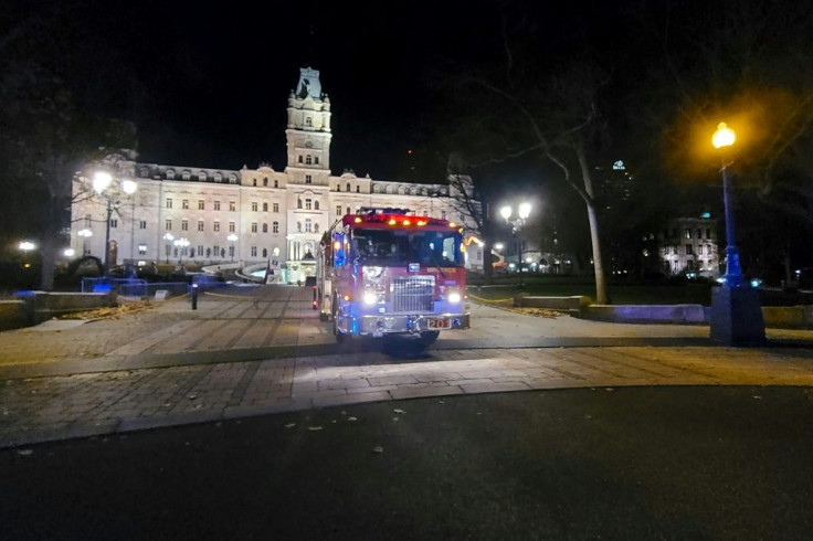 A fire truck in Quebec City, early on November 1, 2020, after two people were killed by a sword-wielding suspect dressed in medieval clothing